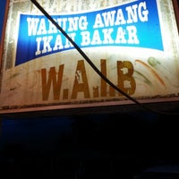 Photo taken at Warung Awang Ikan Bakar by Junaidi Y. on 12/9/2012
