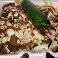 Photo taken at Halal Food Cart on 34th Ave by Gehad S. on 6/5/2014