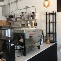 Photo taken at Punctum Coffee Roasters by Tolga Ö. on 8/18/2017