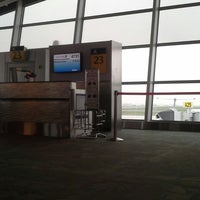 Photo taken at Gate A23 by Jiaxin L. on 4/16/2013