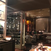 Photo taken at Wolfgang Puck American Grille by Amy K. on 3/9/2018