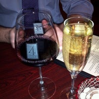 Photo taken at 4 Sisters Wine Bar &amp;amp; Tapas by Kris H. on 11/29/2012