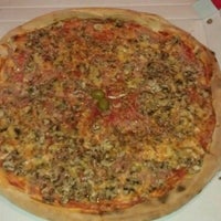Photo taken at Pizzeria-grill Tim by Lara B. on 10/18/2012
