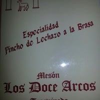 Photo taken at Mesón Los Doce Arcos by Nora G. on 2/17/2013