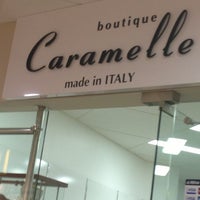 Photo taken at Caramelle Boutique by Angelina G. on 5/10/2013