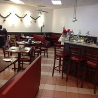 Photo taken at La Perla Peruvian Restaurant by Hajime M. on 12/10/2012