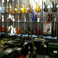 Photo taken at Guitar Center by Kim H. on 12/15/2012