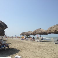 Photo taken at Playa Las Américas by Diana on 1/19/2013