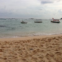 Photo taken at Unawatuna Beach by Randika R. on 5/1/2013