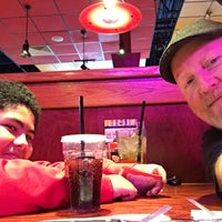 Photo taken at Red Robin Gourmet Burgers and Brews by Patrick on 12/15/2015