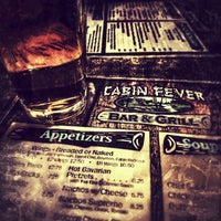 Photo taken at Cabin Fever Bar &amp;amp; Grill by Jennifer D. on 3/7/2020