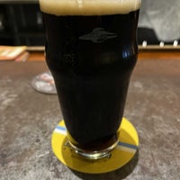 Photo taken at Flying Saucer Draught Emporium by Christopher S. on 12/17/2022