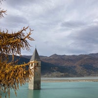 Photo taken at Reschensee / Lago di Resia by Mauro R. on 10/30/2021