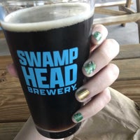 Photo taken at Swamp Head Brewery by Katie D. on 2/25/2023