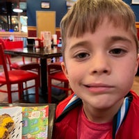 Photo taken at Red Robin Gourmet Burgers and Brews by Lou X. on 3/2/2023