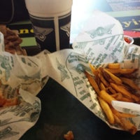 Photo taken at Wingstop by Kenny M. on 4/3/2014
