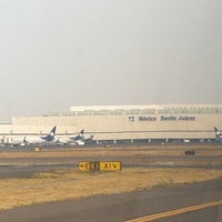 Photo taken at Terminal 2 by Juan C. on 4/14/2013