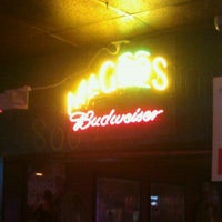 Photo taken at Magoos Bar and Grill by Truong H. on 9/21/2012