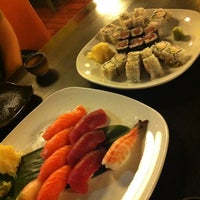 Photo taken at Sushi Castle by Julie F. on 12/8/2012