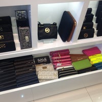 Photo taken at Michael Kors by Catherine V. on 4/25/2013