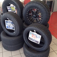Photo taken at Discount Tire by Natasha H. on 7/10/2015