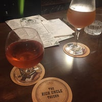 Photo taken at Rich Uncle Tavern by Rebecca M. on 7/21/2018