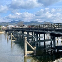 Photo taken at Togetsu-kyo Bridge by Yoshi K. on 3/25/2024