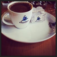 Photo taken at Caribou Coffee by Burcu Selçuk D. on 4/13/2013