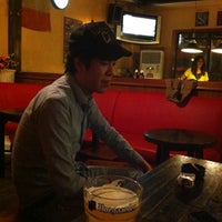 Photo taken at Shamrock Irish Pub 三叶草酒吧 by Олеся С. on 10/2/2012