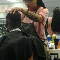 Photo taken at Retro-Lutions Barbershop by William J. on 10/19/2012