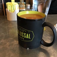 Photo taken at Colossal Café by Tonya D. on 5/6/2017