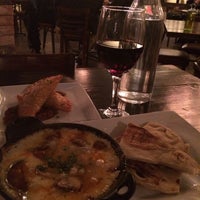 Photo taken at Barraca Paella and Tapas Bar by Alfred M. on 1/26/2014