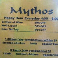 Photo taken at Mythos Bar &amp; Restaurant by Blake G. on 5/5/2012