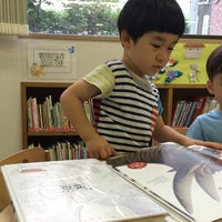 Photo taken at Tomigaya Library by Shuichi S. on 6/29/2014