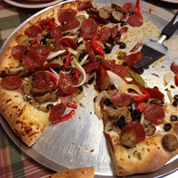 Photo taken at Authentic New York Pizza by Mindy L. on 5/24/2014
