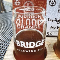 Photo taken at Bridge Brewing Company by Andrew V. on 9/2/2022