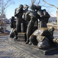 Photo taken at Immigrants Sculpture by Alexander P. on 1/3/2016
