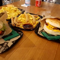 Photo taken at BURGER HOME by Giannis D. on 12/19/2016