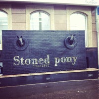 Photo taken at Stoned Pony by Valentine L. on 7/12/2013