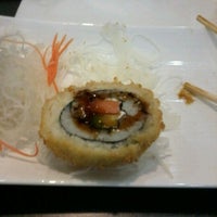 Photo taken at I-KE-SU Kaiten Sushi by MaFee O. on 10/20/2012