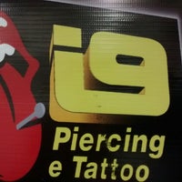 Photo taken at i9 piercing e tattoo by Gilbert T. on 2/13/2014