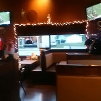 Photo taken at Cinder&amp;#39;s Charcoal Grill by P J E. on 12/2/2012