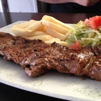 Photo taken at Riquisimo BBQ Restaurante by Alexandra P. on 9/25/2012
