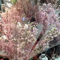 Photo taken at Aoyama Flower Market by もろ も. on 3/19/2015