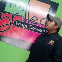 Photo taken at Fifty Grilled - Wings Gourmet by Roberto C. on 6/8/2013