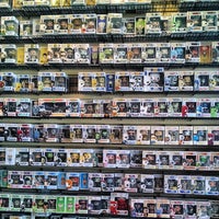 Photo taken at Mike&amp;#39;s Comics + Collectables by Daniel P. on 3/8/2015