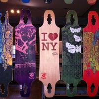 Photo taken at Bustin Boards Skateboard Shop by Cecilia P. on 12/30/2012