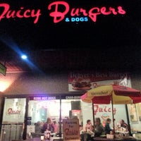 Photo taken at Juicy Burgers &amp;amp; Dogs by Justin W. on 11/19/2012