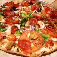 Photo taken at Pieology Pizzeria by Alex D. on 3/7/2015