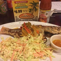 Foto tomada en Mangos Caribbean Restaurant  por Matthew &amp;quot;True&amp;quot; N. el 12/1/2015